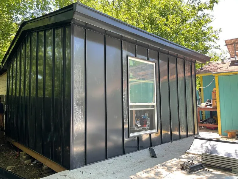 Black standing seam metal wall panels for Roof Inspection in West Plains